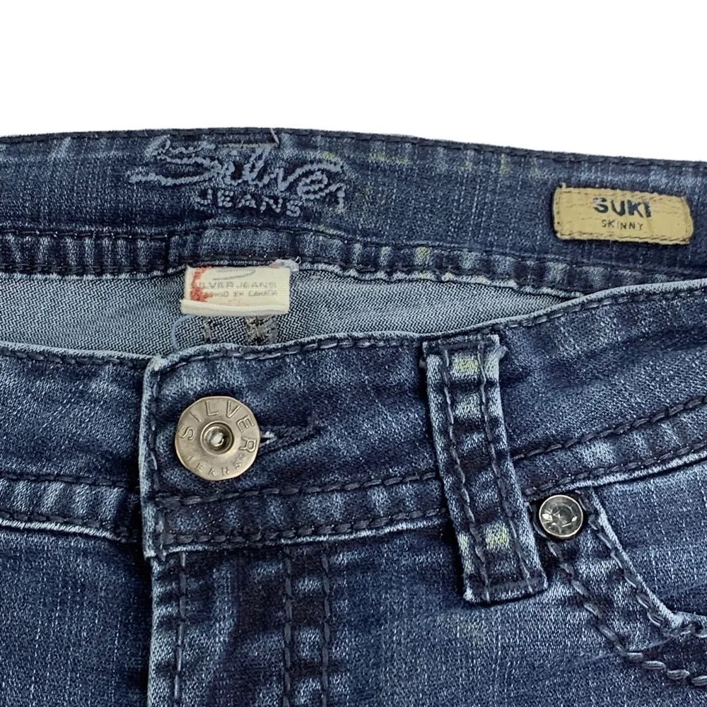 Silver SUKI Skinny Jeans with Embroidered Navy Blue S on Back Pockets W 29”X31”